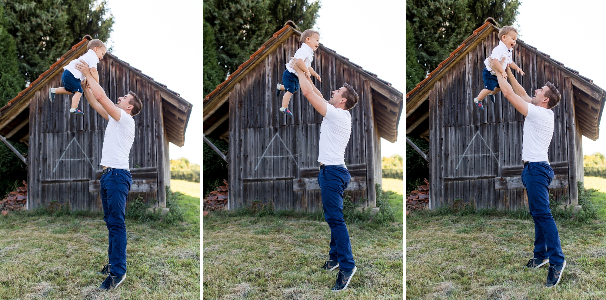 Papa lässt seinen kleinen Sohn hoch fliegen.