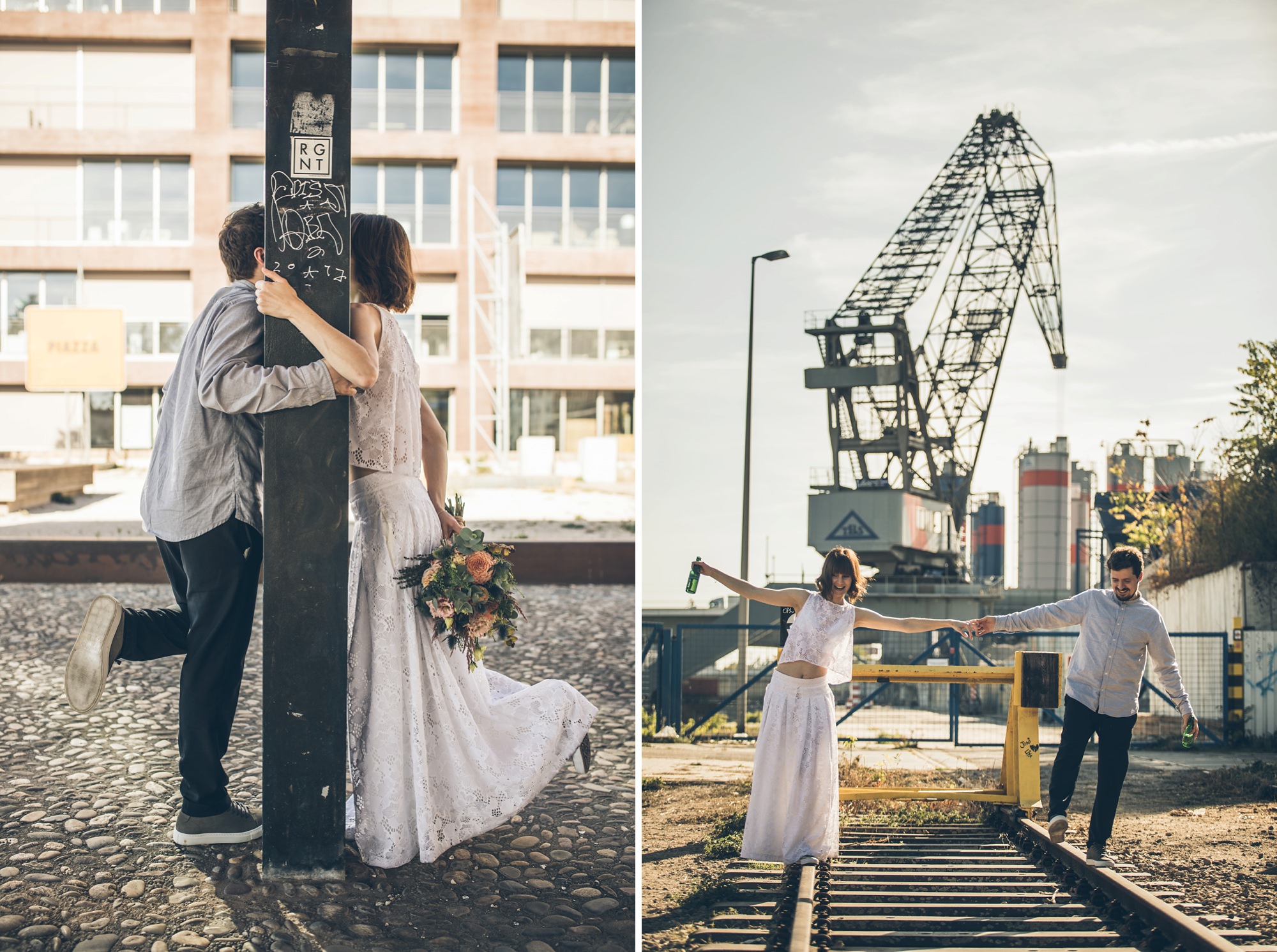 Braut und Bräutigam balancieren auf Schienen vor einem Hafenkran im Jungbusch Mannheim.